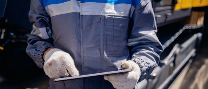 Worker operating on a tablet