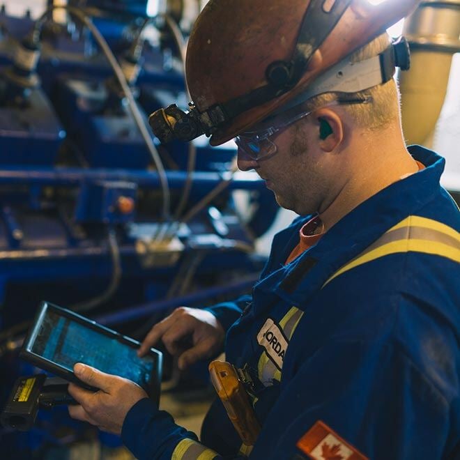 Worker operating on a tablet